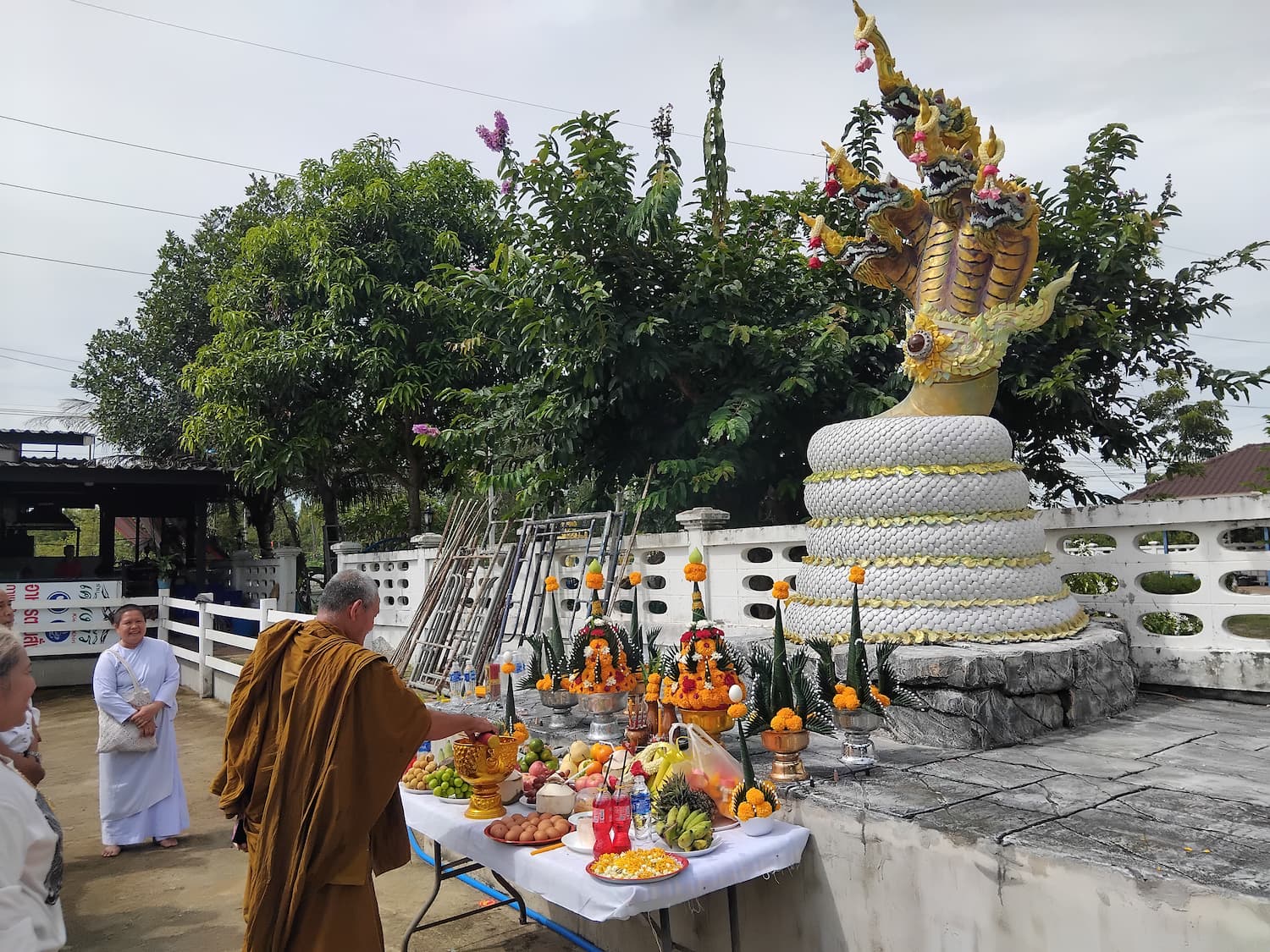 Monk blessing naga dragon at Kieng Kiri restaurant